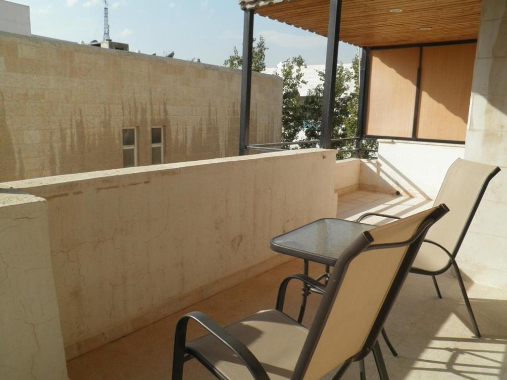 Granada Suites Hotel Amán Habitación foto