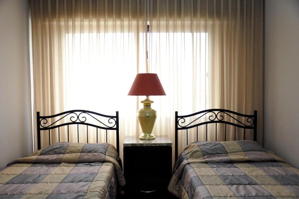 Granada Suites Hotel Amán Habitación foto